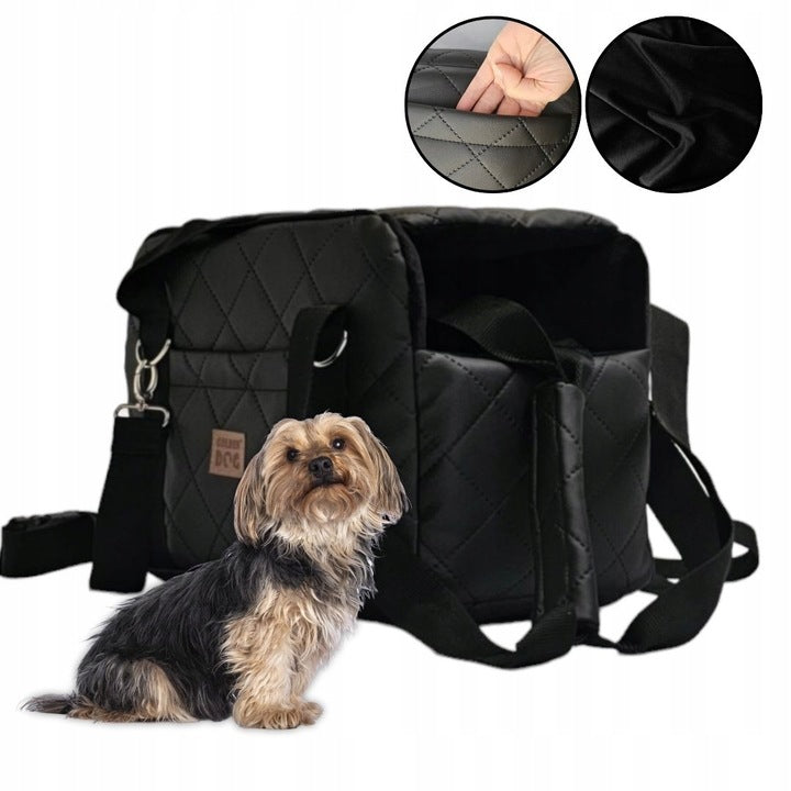 A black quilted pet carrier bag with metallic fittings and an adjustable shoulder strap, suitable for small dogs or cats—ideal for car journeys or daily walks.