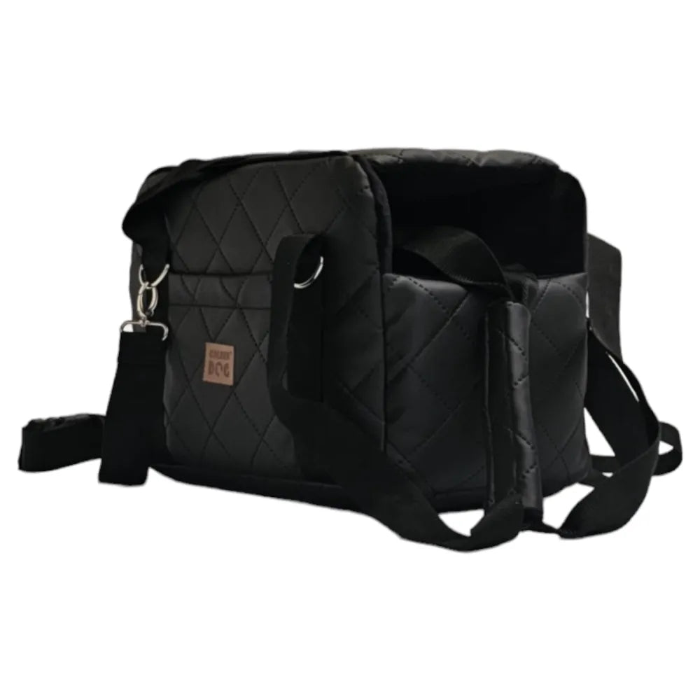 A black quilted pet carrier bag with metallic fittings and an adjustable shoulder strap, suitable for small dogs or cats—ideal for car journeys or daily walks.