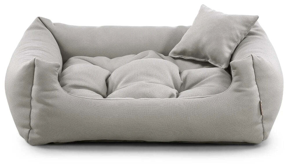 Stylish corduroy dog bed with pillow, designed for comfort and durability.