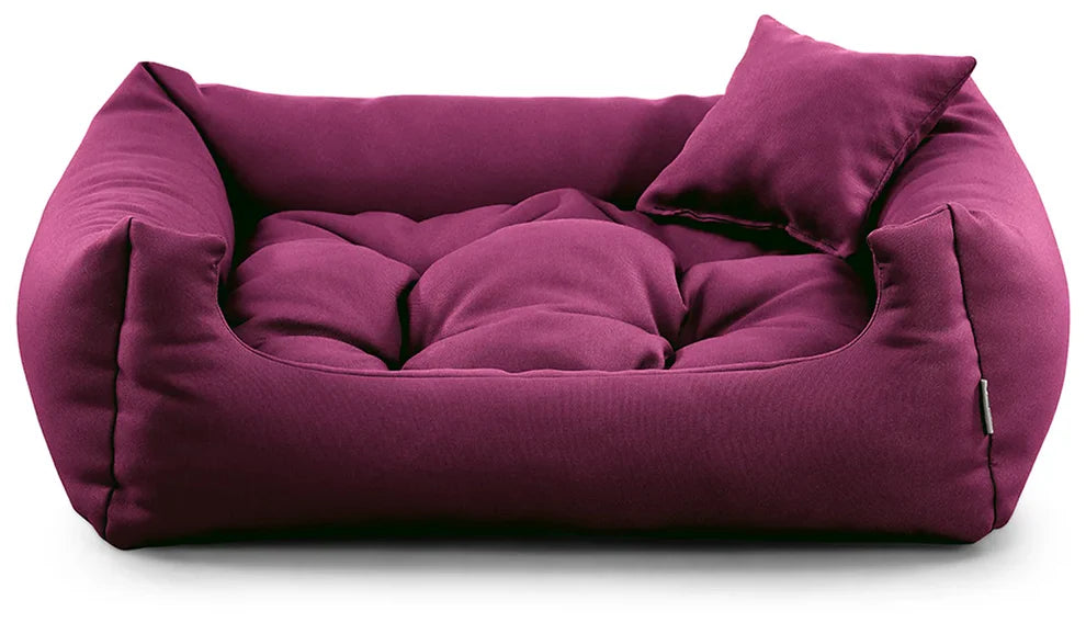 Cosy pet bed in purple tone, perfect for dogs of all sizes.