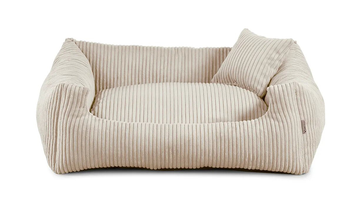 Soft Stripe dog bed in cream colour fabric with small pillow.