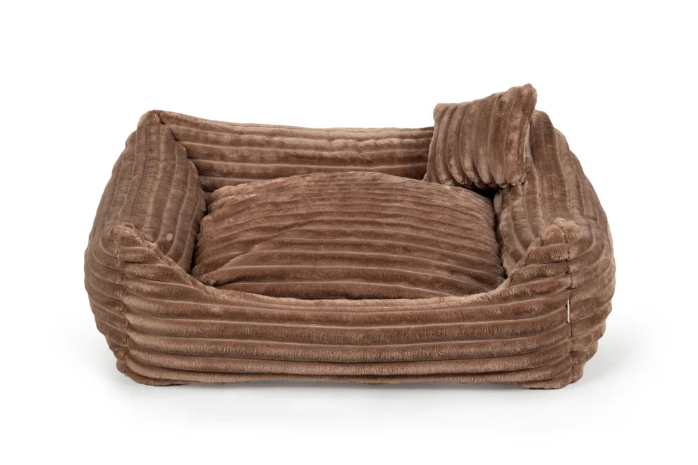 Brown plush dog bed with ribbed texture and shredded foam filling — Dream model, soft-touch fabric, machine washable, and ideal for dogs who love to snuggle