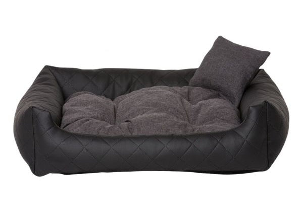 Black quilted eco-leather dog bed with soft-touch cushion — luxury pet bedding designed for comfort, durability, and modern interiors.