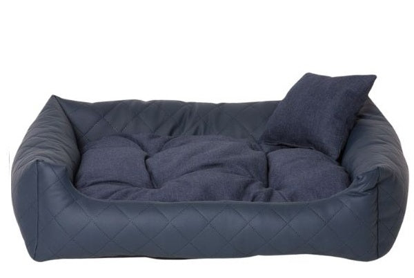Navy quilted eco-leather dog bed with soft-touch cushion — luxury pet bedding designed for comfort, durability, and modern interiors
