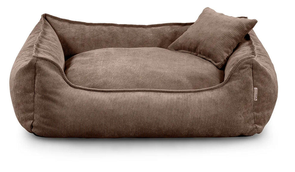 Close-up of Lucky dog bed in brown corduroy fabric, showing zippered cushion and durable stitching