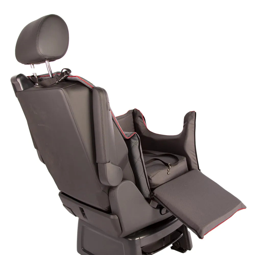 Stylish grey quilted dog car seat with red piping, Golden Dog logo patch and embroidered paw print — securely fastened for comfortable car travel