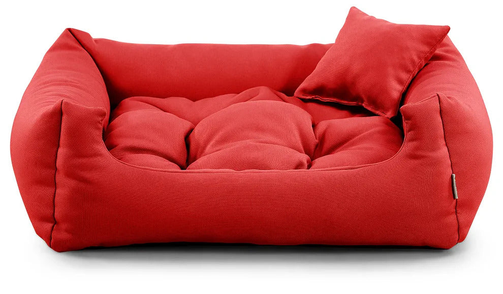 Cosy pet bed in red tone, perfect for dogs of all sizes.