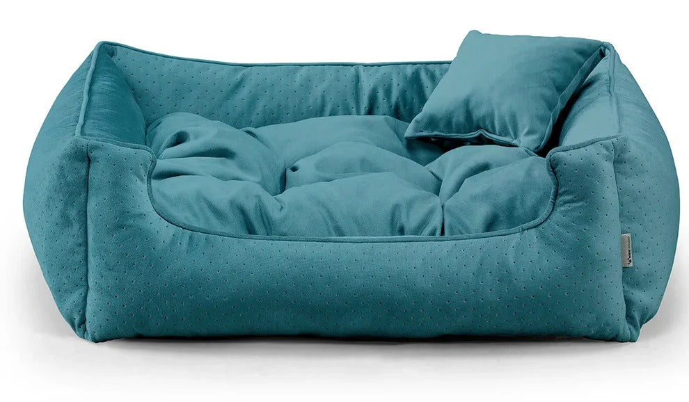 Close-up of Relax Bless dog bed in sea green fabric.