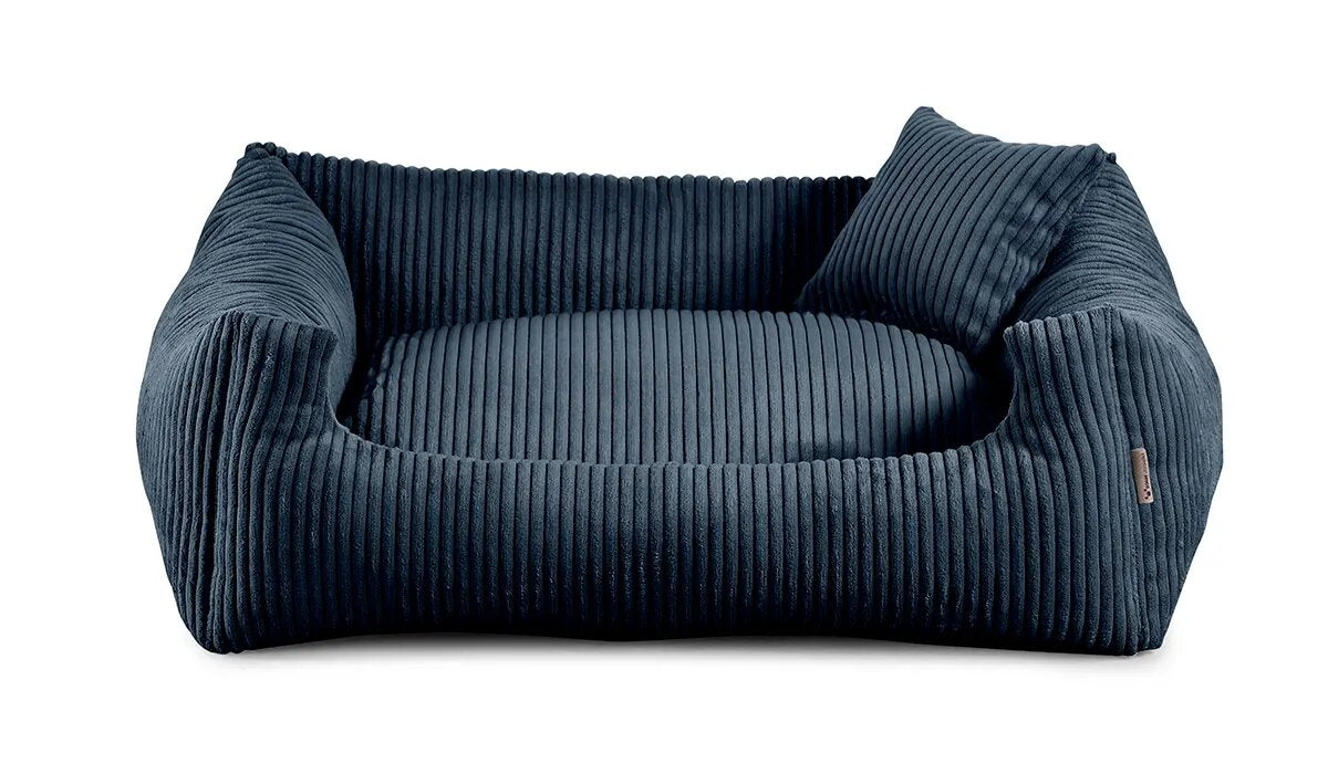 Soft Stripe dog bed in navy colour fabric with small pillow.