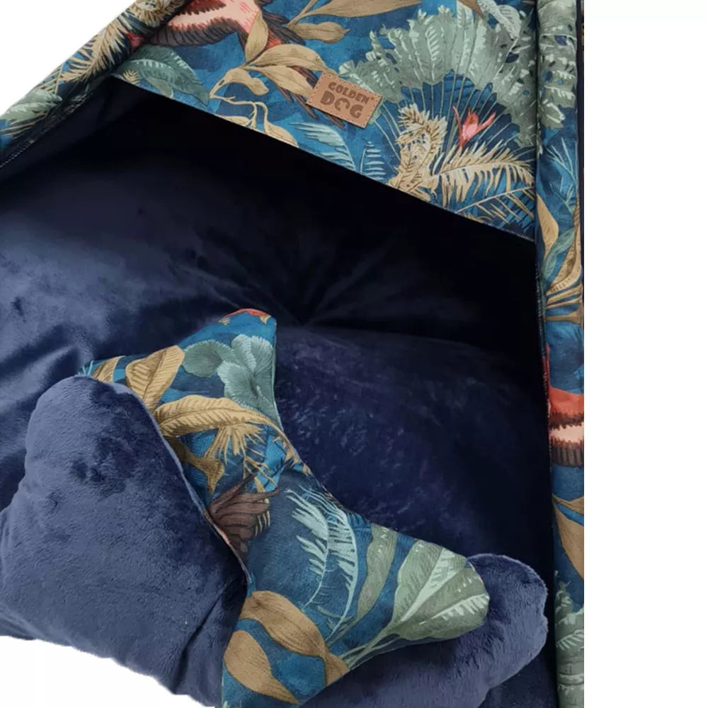 Tipi-style dog bed with dark floral patterned fabric, featuring a soft blue cushion and bone-shaped pillow β cosy tent retreat for pets with decorative charm