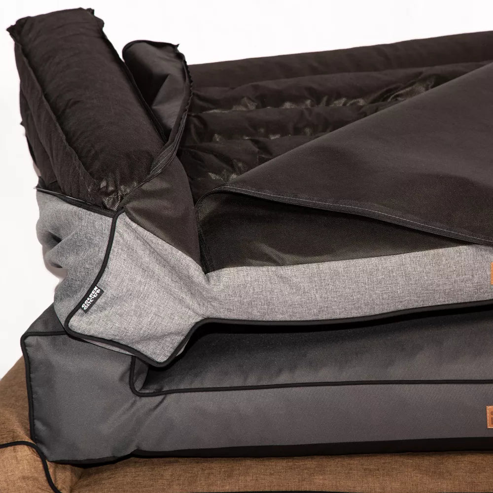 Close-up of Torres dog bed in brown melange with zippered cover — durable Oxford fabric and removable upholstery for easy cleaning and pet comfort