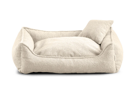 Cream bouclé dog bed with shredded foam filling — Bear model, soft-touch fabric, easy to clean, and ideal for dogs of all sizes