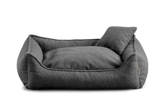 Dark grey bouclé dog bed with shredded foam filling — Bear model, soft-touch fabric, easy to clean, and ideal for dogs of all sizes