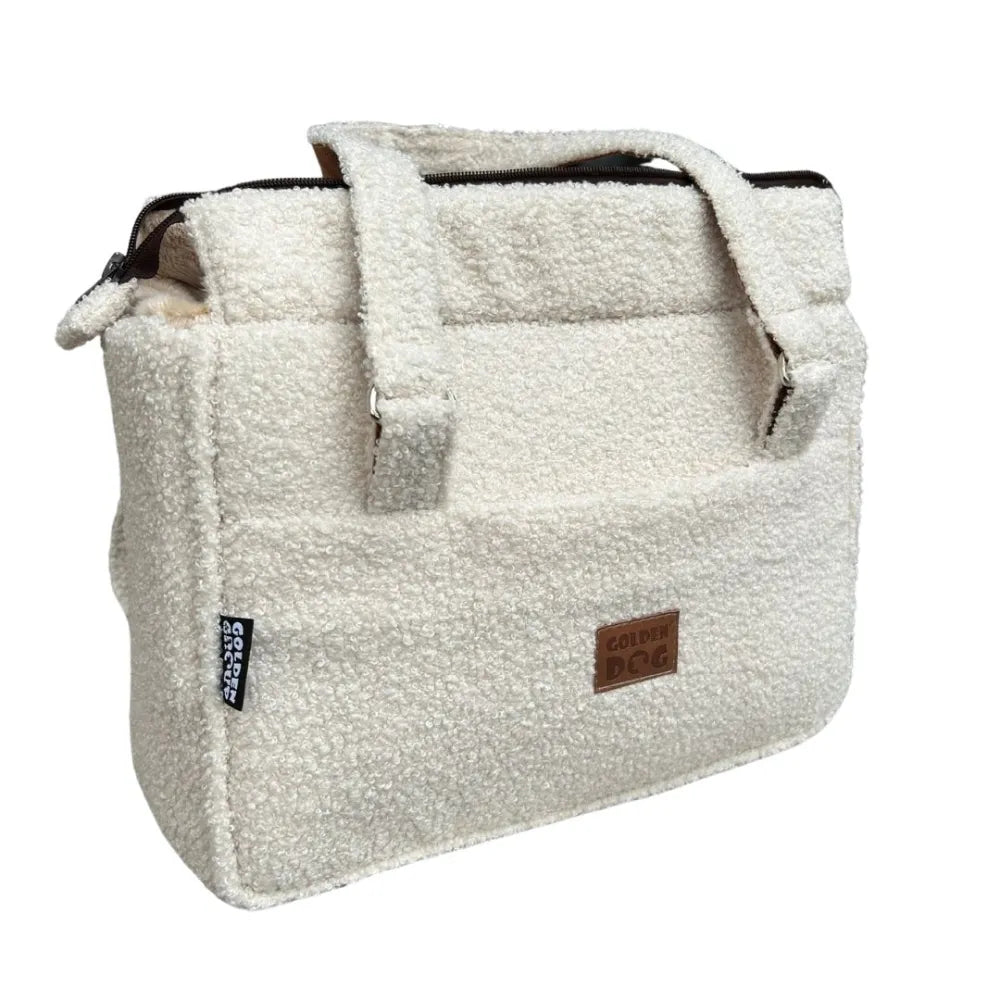 Stylish cream teddy fabric handbag with soft lining, brown handles and a practical front pocket – perfect for cosy autumn and winter outings.
