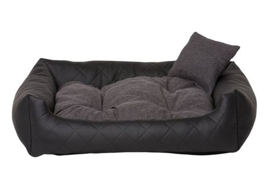 Black quilted eco-leather dog bed with soft-touch cushion — luxury pet bedding designed for comfort, durability, and modern interiors.