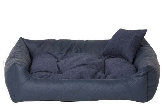 Navy quilted eco-leather dog bed with soft-touch cushion — luxury pet bedding designed for comfort, durability, and modern interiors