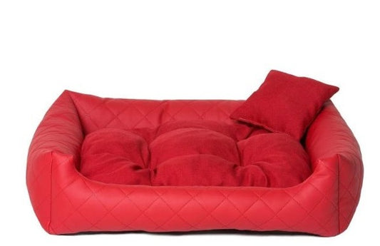 Red quilted eco-leather dog bed with soft-touch cushion — luxury pet bedding designed for comfort, durability, and modern interiors