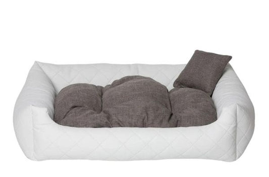 White quilted eco-leather dog bed with soft-touch cushion — luxury pet bedding designed for comfort, durability, and modern interiors