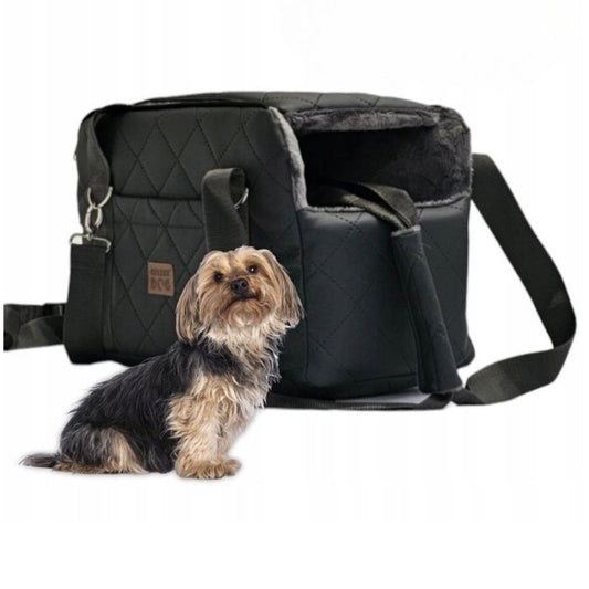 Graphite quilted dog travel bag with brown shoulder straps and soft plush interior — a stylish and secure pet carrier for small breeds.