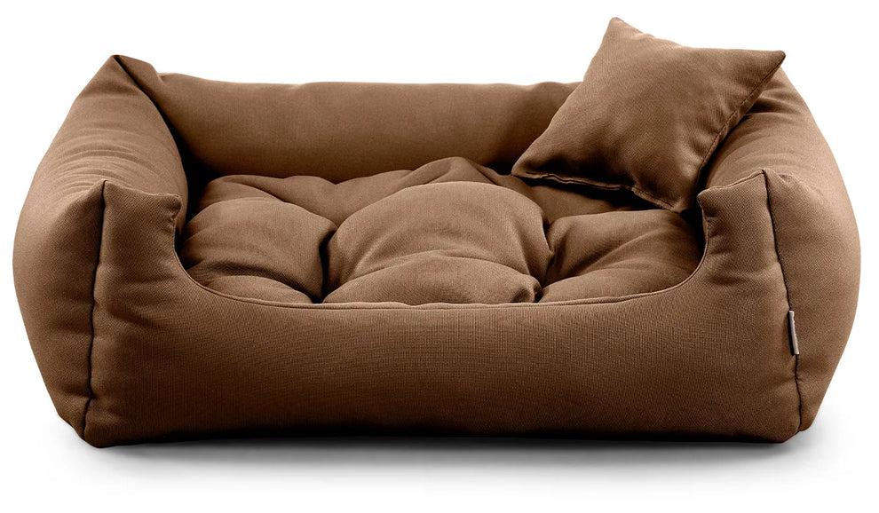 Cosy pet bed in brown tone, perfect for dogs of all sizes.