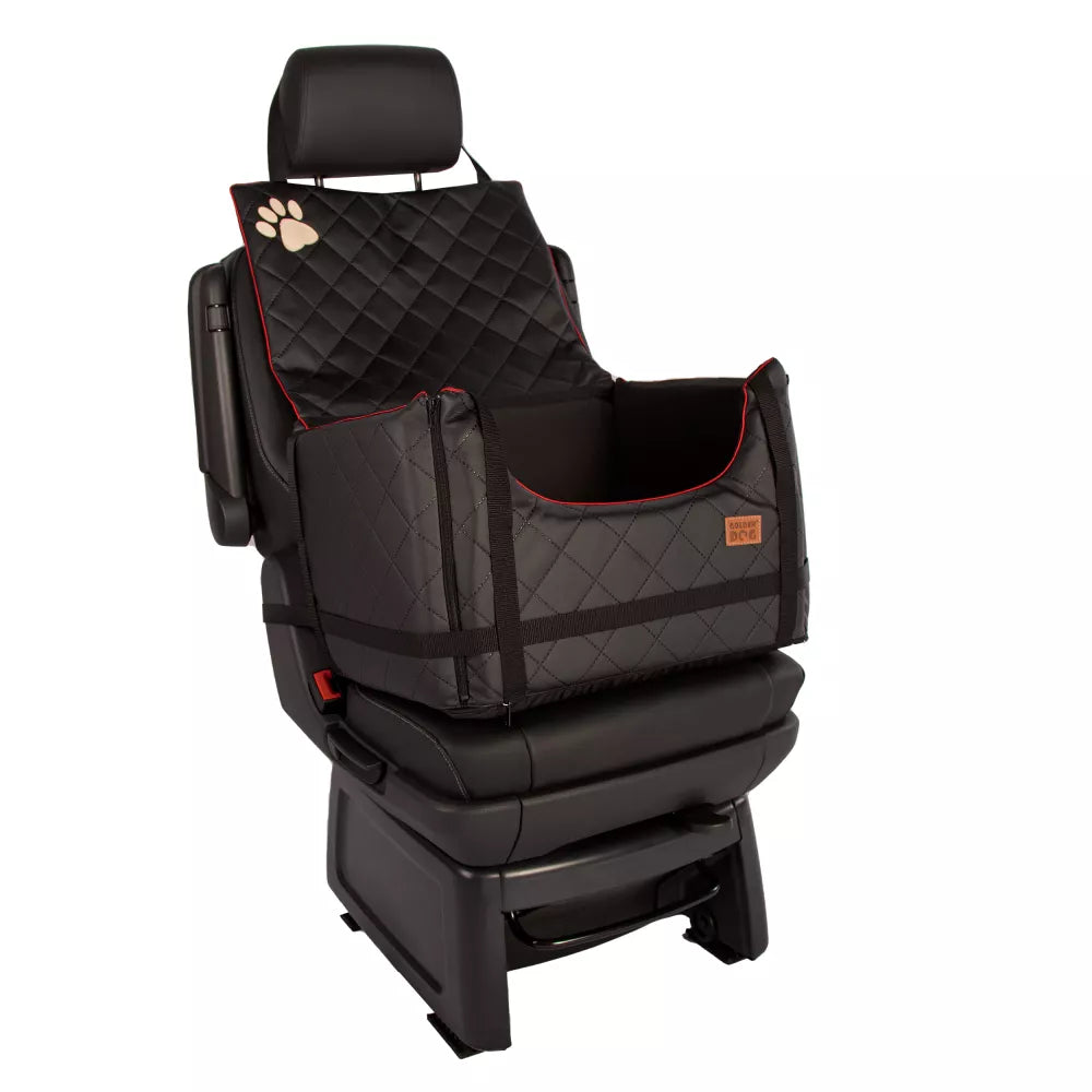 Stylish black quilted dog car seat with red piping, Golden Dog logo patch and embroidered paw print — securely fastened for comfortable car travel