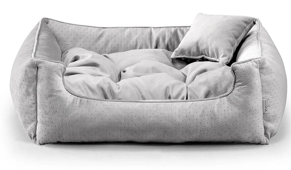 Close-up of Relax Bless dog bed in light grey fabric.