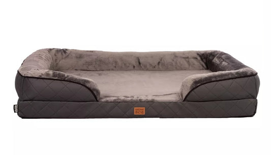 Orthopaedic dog bed in graphite eco-leather with raised sides and soft blanket — designed for joint support and comfort