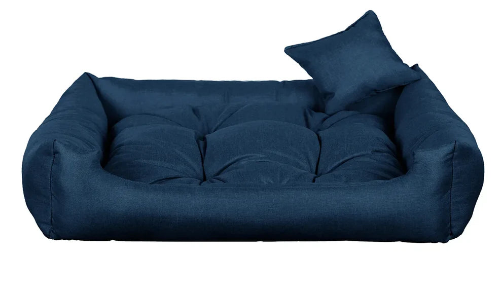 Navy dog bed with thick cushion and raised sides, made from water-resistant, scratch-resistant upholstery — Sleepy Cora model for dogs of all sizes