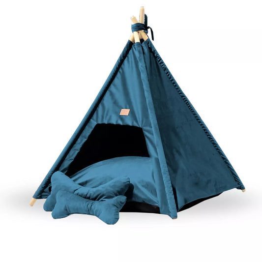 Tipi-style dog bed made from blue Royal Velvet fabric — includes soft cushion and bone-shaped pillows, supported by wooden poles