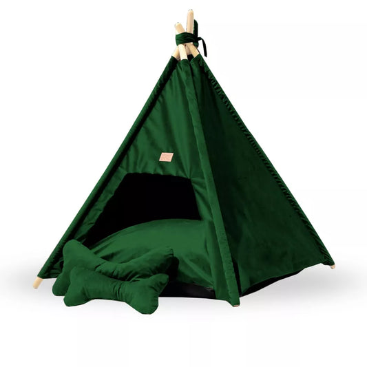 Tipi-style dog bed made from bottle green Royal Velvet fabric — includes soft cushion and bone-shaped pillows, supported by wooden poles